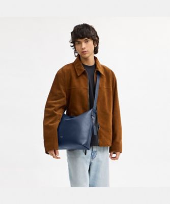 モット メッセンジャー バッグ 38 | COACH/コーチ | 三越伊勢丹